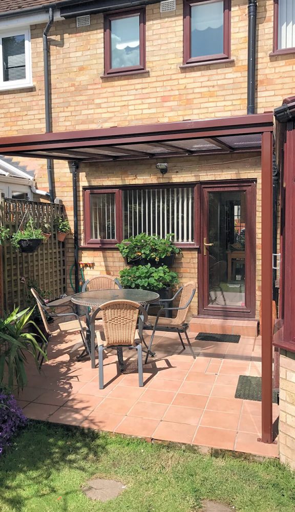 Brown uPVC veranda installation