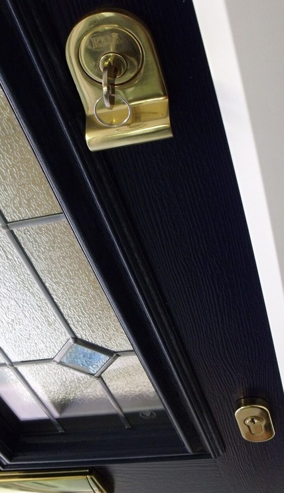 A close up of a dark blue composite door