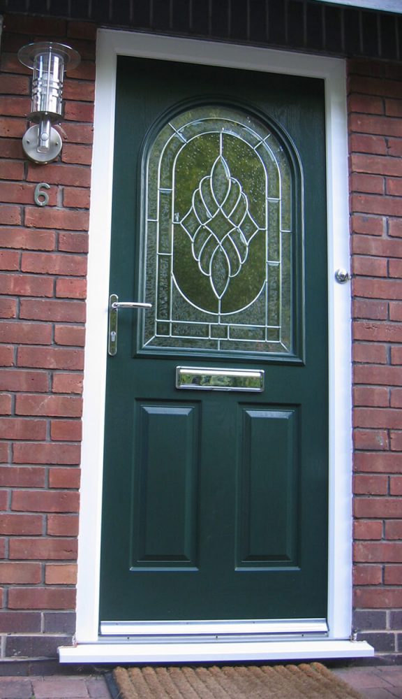 A dark green composite door
