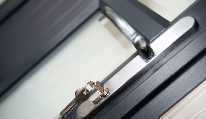 Grey uPVC entrance door close up