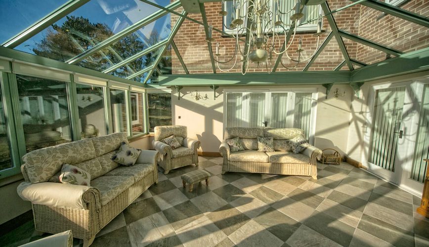 Sage green conservatory interior view