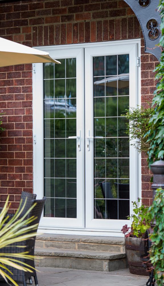 White uPVC french doors with leaded glass