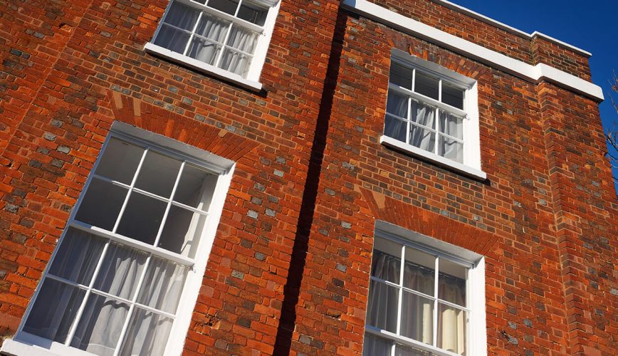 White uPVC vertical sliding windows installations